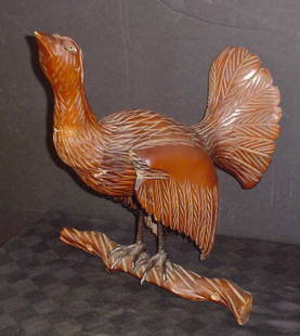 CARVED WOOD BIRD ON BRANCH 14304: Large fancy carved wood bird. Dimensions: 19 1/2" H x 18" W x 18 1/2" D Age: C. 1930 Material: Wood