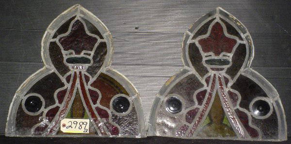 2 PIECES OF GOTHIC STAINED GLASS 2989: Two pieces of gothic stained glass. Dimensions: 18 1/2"H x 18 3/4"W Age: 1890 Material: Stained Glass