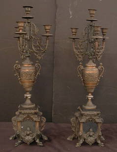 PAIR OF CANDELABRAS W/MARBLE INSERTS 15636: Fabulous pair of candelabras with black marble inserts, Knight bust, dolphin, and hoof feet. Dimensions: 26 3/4" H x 8 1/2" W x 8 1/2" D Age: C. 1900 Material: Marble & Spelter