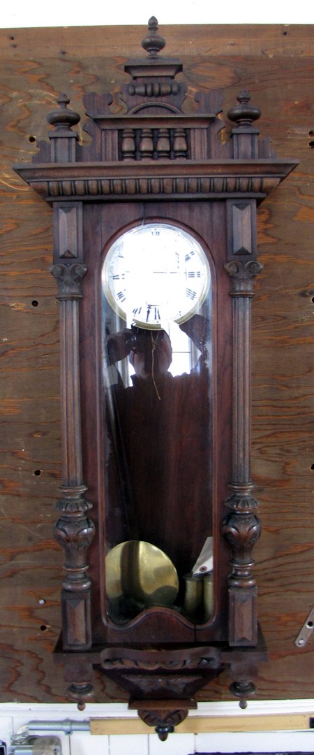 GUSTOV BECKER WOOD WALL CLOCK 750: Gustov Becker wood wall clock. Dimensions: 53"H x 18"W x 8"D Age: C.1880 Material: Wood