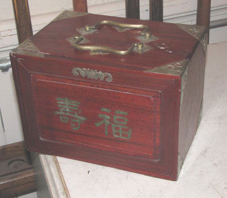 SET OF IVORY MAH JONG IN WOOD CASE 3395: Set of ivory Mah Jong in a wooden case with brass corners. Dimensions: 6 1/2"H x 9"W x 6 1/4"D Age: C. 1900Material: Wood and Ivory