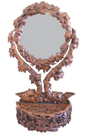 BLACK FOREST DRESSER MIRROR W/LEAF MOTIF 1541: Intricate Black Forest dresser mirror with highly carved branch supported mirror entwined in elaborate leafed vines with bottom storage drawer. Dimensions: 32"H x 18 1/2"W x 16"D Age: C. 1870 Material