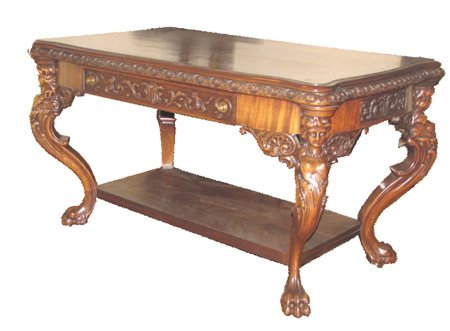 RJ HORNER MAHOGANY WINGED LADIES PARTNERS DESK 3334: Impressive RJ Horner partners desk in carved mahogany with elaborate winged supports. Dimensions: 31"H x 54"W x 32"D Age: C.1880 Material: Mahogany