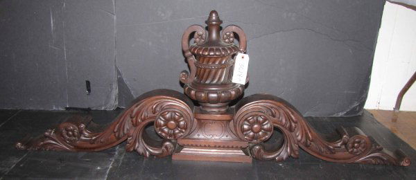 CVD WALN CREST W URN TOP FLOWER BULLESEYES 3614: Carved walnut crest with double handled urn top flower bulleseyes and scrolled acanthus leave sides, incised on back side as well. Material: Walnut. 21" H x 57"W x 9"D Age: 1880 PLEASE SEE LOTS 222 -