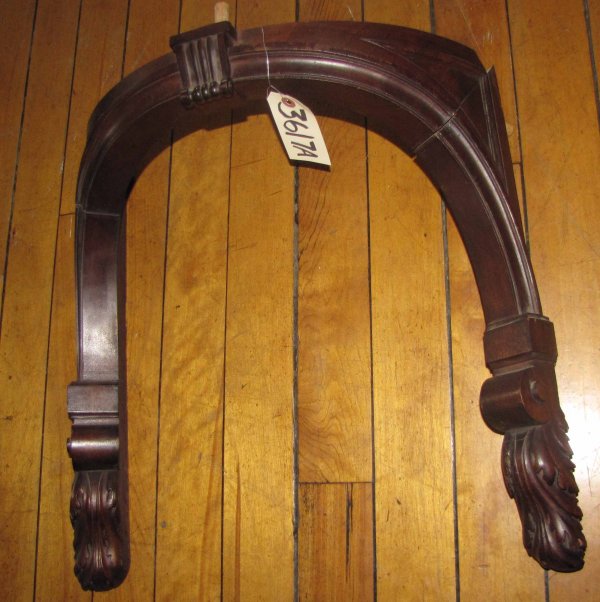 CVD WALN CURVED NICHE BRACKET TYPE ARCH 3617: Carved walnut curved niche bracket type architectural elements with acanthus leave ends. Material: Walnut 20"H x 20.5"W x 8.5"D Age: 1880 PLEASE SEE LOTS 222 - 234 FOR MORE GREAT CARVED CREST & EXTRA
