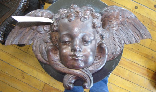 CARVED WALNUT CREST OF WINGED CUPID HEAD. 3616B