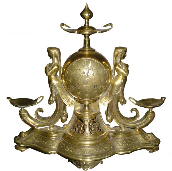 CST BRONZE AMERICAN RENAISSANCE MANTLE CLOCK 3113: Highly detailed cast bronze American Renaissance mantle clock with ladies in Pharoah headdress and Aladdin lamps. Dimensions: 13"H x 13"W x 6"D. Age: 1870. Material: Cast bronze