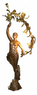 LG. L. STEINER VICTORIAN NEWELL POST LIGHT 3912: Oversized Victorian three tone French newel post lamp of lady holding lit floral garland. Artist signed: Steiner. Dimensions: 53"h x 24"L Materials: Bronze and spelter. Age: 1890