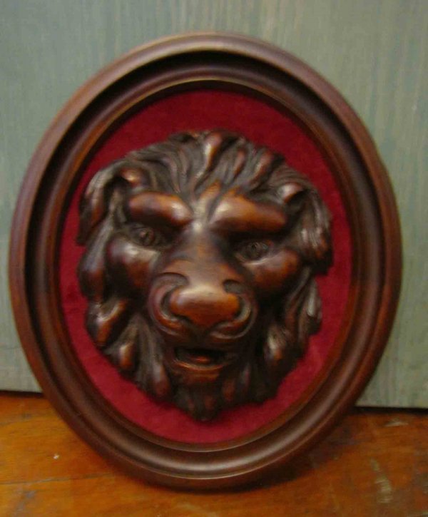 FRAMED BLACK FOREST CARVED WOOD LION HEAD 3969: Framed Black Forest carved wood lion head plaque Dimensions: 14.25"H x 12"W x 5"D Age: 1880 Material: Wood