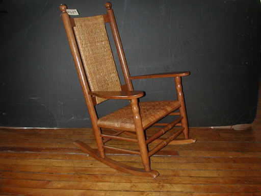 7: CRACKER BARREL OAK & WICKER ROCKING CHAIR (1689)