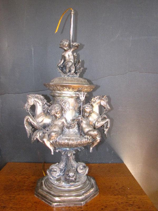ORNATE FRENCH SILVER PLATED TBL LAMP (1627): Ornate French silver plated table lamp with remarkable ring of horses with cupids holding doves & pitchforks on top of urn supported by four dolphins with kneeling cherub atop in seashell, marked Pari