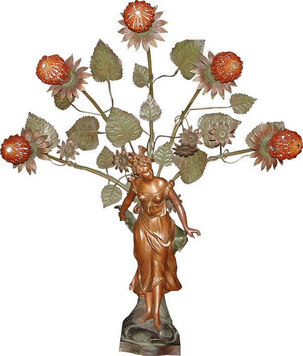 FIGURAL 5 ARM NEWELL POST LIGHT W/ FLOWERS 1698: Lovely two-tone spelter five arm Newell post light of Flora with sunflowers. Dimensions: 38"H x 31"W x 20"D Age: 1920 Material: Spelter