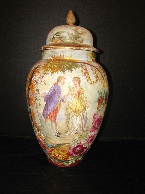 ROYAL BONN TAPESTRY JAR W/ COURTING COUPLE (3353): Decorative Royal Bonn Tapestry jar w/ Victorian courting couple in woodlands with multi-floral designed base, marked Royal Bonn. Dimensions: 20"H x 10"D Age: 1880 Material: Porcelain