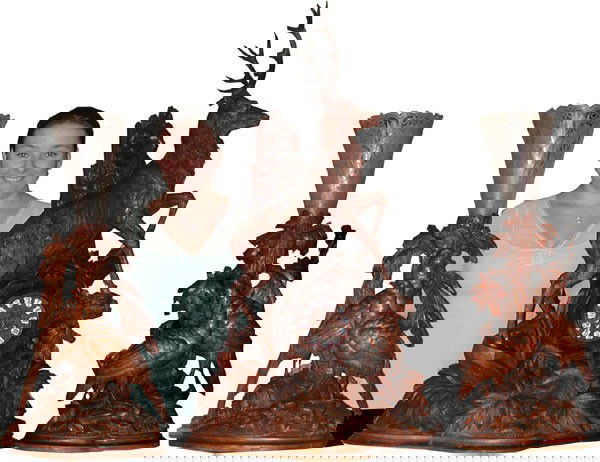 3 PC BLACK FOREST CLOCK SET FULLY CARVED 16079: Out of this world highly detailed 3 pc Black Forest clock set with stellar buck standing over tree trunk formed clock with fern & foliate carvings and side cut & etched epergnes with pheasants. Dimens