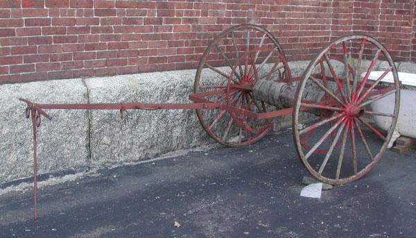 ANTIQUE WOOD WHEELED FIREMAN HOSE CART 2869: Antique wood wheeled fireman hose cart with cast iron rod for two men to pull. Dimensions: 44"H x 56"W x 122"L Age: 1880 Material: Wood & Cast Iron Rod