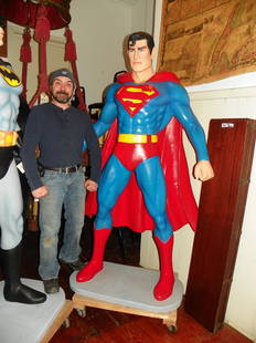 OVERSIZED SUPERMAN STATUE 4332: Contemporary fiberglass oversized statue of Superman (Tom not included) 73"H x 44.5"W x 20"D. Age: Contemporary. Material: fiberglass