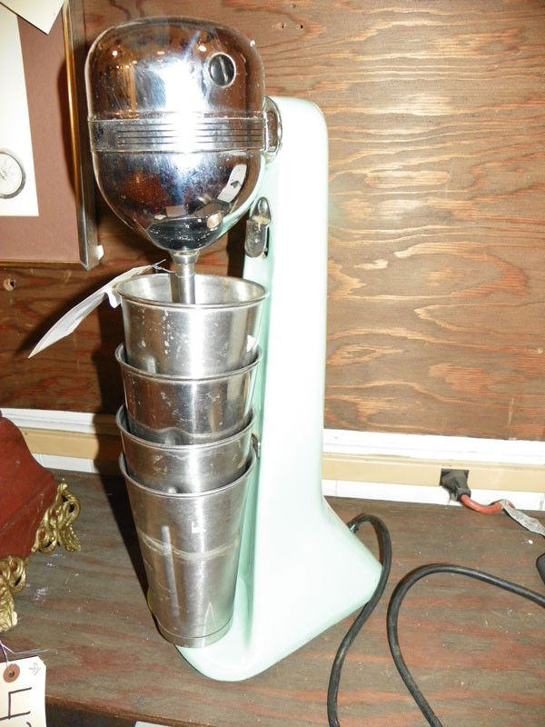 OSTER ICECREAM PARLOUR BELENDER 4383: Oster icecream parlour blender enamelled, with four chrome cups. 19"H x 8"W x 6"D. C.1950's Material: chrome & enamelled