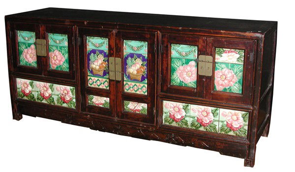 CABINET W/ PORCELAIN PLAQUES IN FLORAL MOTIF 4176: Striking cabinet with porcelain plaques in floral motif. Great for TV Stand! Dimensions: 27"H x 61"L x 17.5"D Age: 1930 Material: Wood & Tile