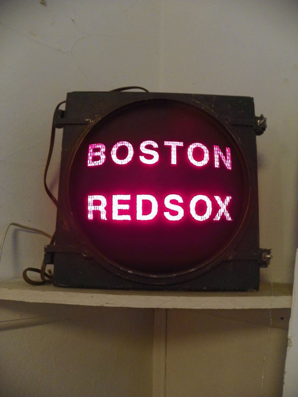 CONTEMPORARY STREET LIGHT SIGN "RED SOX" 4253A: Contemporary street light lamp "Red Sox" 14"H x15"W x 7"D. Contemporary. Material: Painted iron & red glass.