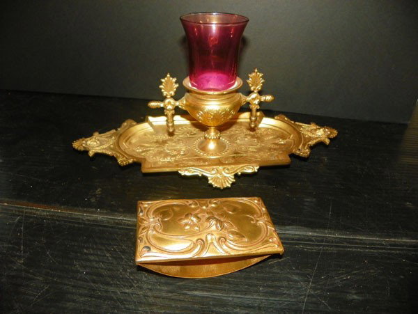 VICT BZ TRAY W/ PINK GLASS CENTER & BLOTTER 2186: Victorian bronze tray with pink glass center and Art Nouveau ink blotter. Dimensions: Tray- 11 1/4 x 6"W x 5 1/2"D Blotter- 4" Age: C1880 Material: Bronze and Glass