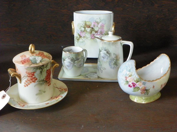 7 PC OR PORCELAIN, LIMOGES, WEIMER & THOMAS (1521): Extraordinary 7 piece lot of china including Weimer tray with cup & pitcher, Thomas covered piece with plate, Limoges oval shaped footed waste paper basket & crescent shaped cradle bowl. Dimensions: V