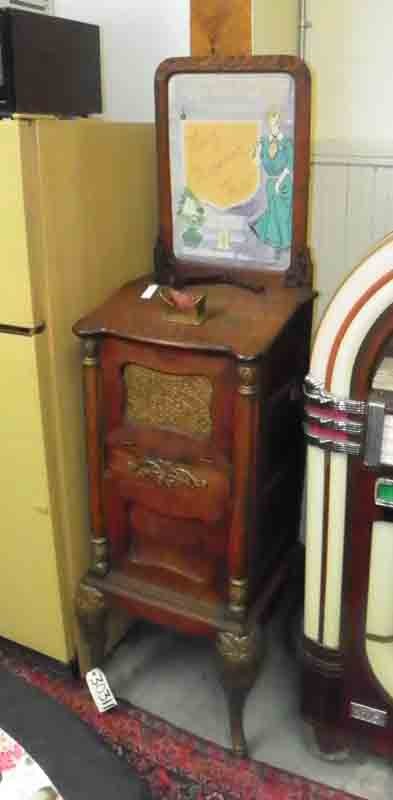 TIGER OAK CAILOSCOPE IRON MOUNTS 30311: Original coin operated carved tiger oak Cailoscope. Dimensions: 72"H x 22"W x 18"D Age: C.1890 Material: Oak and Iron