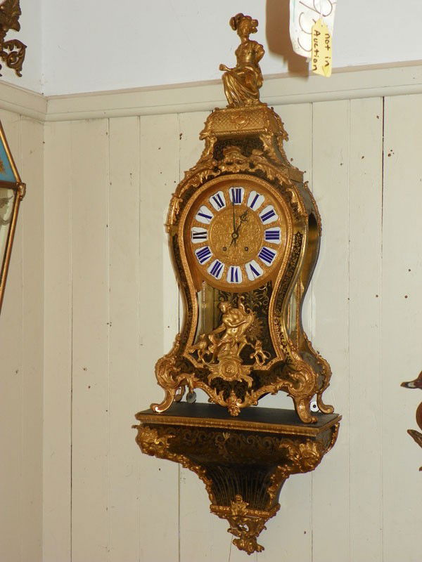 MUSEUM QTY FRENCH ROCOCO BOULLE SHELF CLOCK 994269: Museum quality French Rococo bronze mounted red boulle oversized highly ornate wall mounted shelf clock with seated lady crest on settee, man playing harp flanked by lion and bird, shelf with lovely l