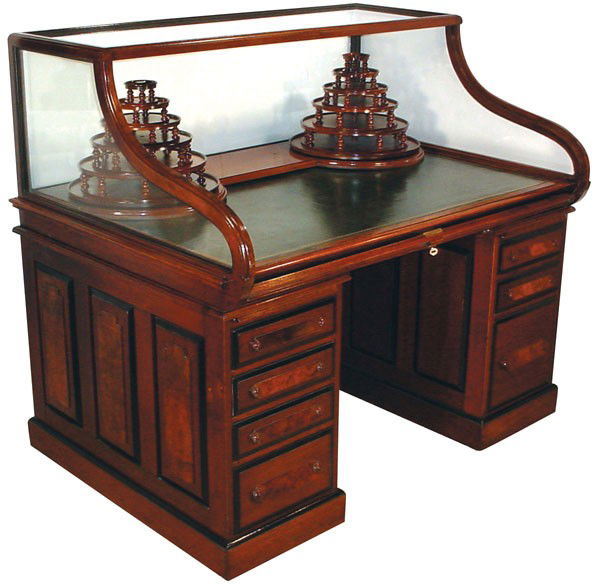 RARE ROLL TOP CUTLER & SON GLASS TOPPED DESK 2898: A historical treasure! This rare Cutler & Son's roll top desk was patented in 1875, in select walnut with burl accents, it's a wonderful example of innovative Victorian design. This desk was originall