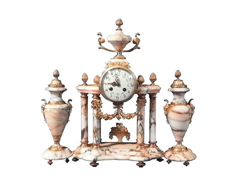3 PC GILT BZ & MRBL CLOCK SET WITH SIDE URNS 16059: Beautiful small 3 piece gilt bronze and marble clock set with column and floral garland motif clock with urn top and side urns. Dimensions: Clock- 17"H x 16.75"W x 5"D Urns- 10.5"H Age: C. 1900 Materi