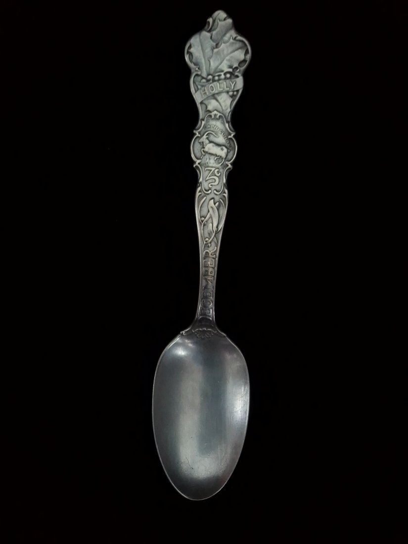 R Wallace & sons sterling zodiac Holly, December spoon, Deer head Hallmark, .855 troy ounces: R Wallace & sons sterling zodiac Holly, December spoon, Deer head Hallmark, .855 troy ounces. I believe this is a fairly old spoon, late 1800s to early 1900s. Attn: Although I have quickly cleaned mos