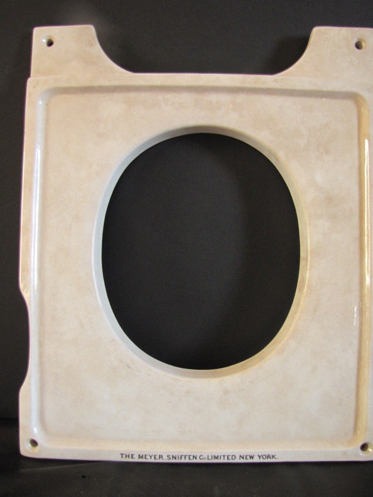 THE MEYER SNIFFEN CO LIMTED NEW YORK PORCELAIN 33L: Signed "The Meyer Sniffen Co. Limited New York" porcelain square lavatory piece with oval cut out center with lip, has a neat finish, marble or antiqued. C.1910. porcelain. 20"H x 16"W x 1"D.