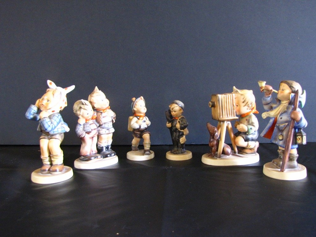 LOT OF 6 ORIGINAL HUMMEL'S W. GOEBEL 61T: Lot of 6 original Hummel's by W. Goebel, Western Germany. Includes Photographer, Toothache #217, Boy with Horn "Hear Yee" #1510, Chimney Sweeper #12 2/0, School Boy 82/0, and Max & Moritz #123. Variou