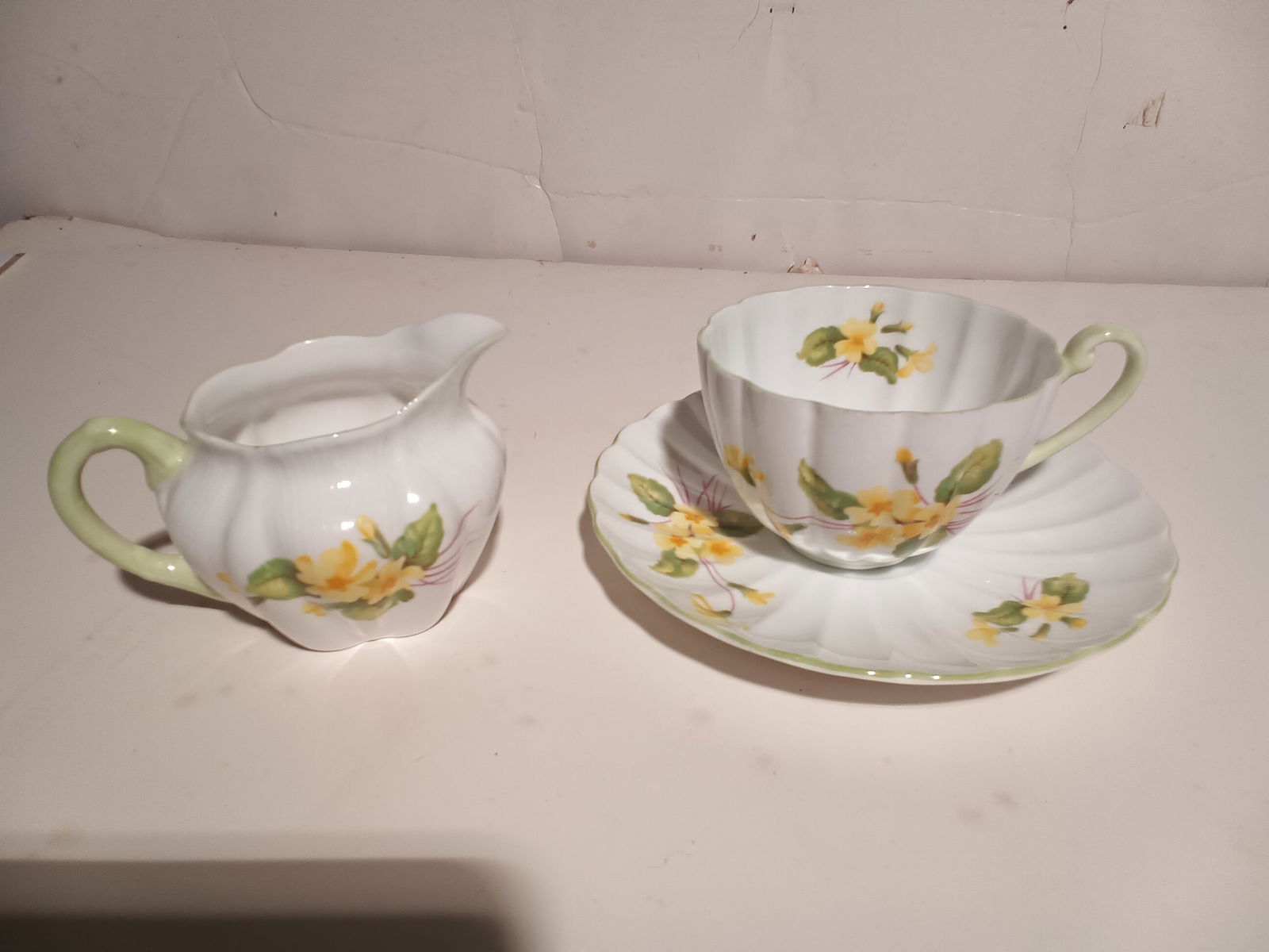 Shelley china lot - 3 pc's Primrose pattern, yellow flowers, cup w/ saucer & creamer (1 of 2)