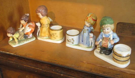 LOT OF 4 PORCELAIN FIGURINES 5529: You are bidding on 4 porcelain figurines of little children.