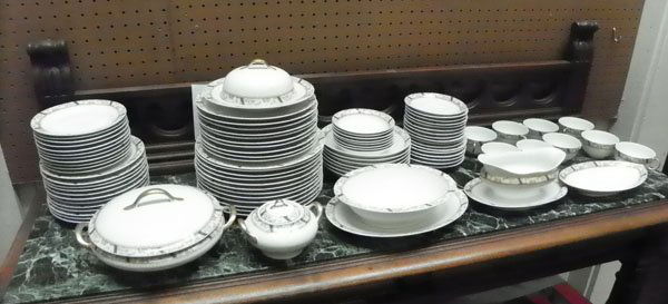 94 PC LIMOGES FRANCE DINNERWARE SET W/FLORAL MOTIF 1522: Extra large Limoges France dinnerware set with painted pink floral motif and gold handles. The set includes 12 lg plates, 10 med plates, 12 sm plates, 11 xs plates, 1 lg pot, 1 sugar bowl, 1 plate wit