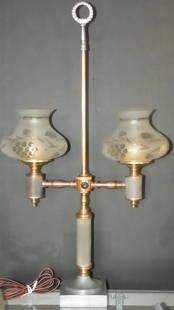 DOUBLE ARM STUDENT LAMP WITH ASTRO SHADES 5527: Two tone double arm student lamp with cut glass astro shades, wreath finial, and turn button. This light has been restored and electrified. Dimensions: 26 3/4"H x 15"W with shades on. Age: C.1910