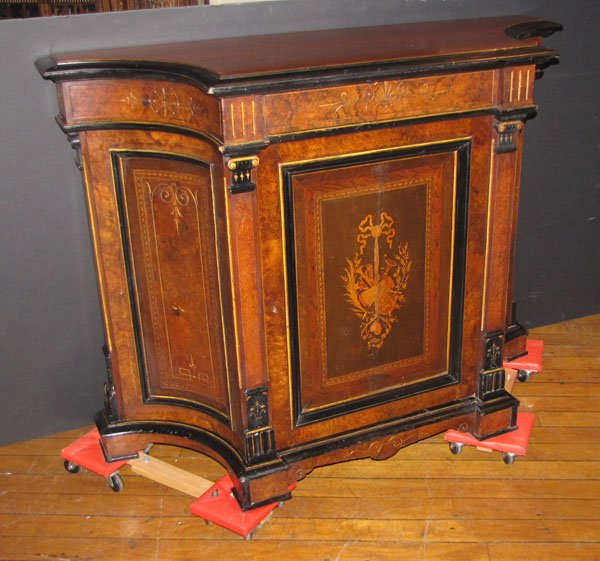 INLAID CREDENZA W/ GOLD INCISING 5490: Inlaid one door credenza with gold incising and ebonized accents. The door features inlaid musical instruments and on each panel is gold incised scroll work. The credenza is 42"H x 54"W x 19 3/4"D.