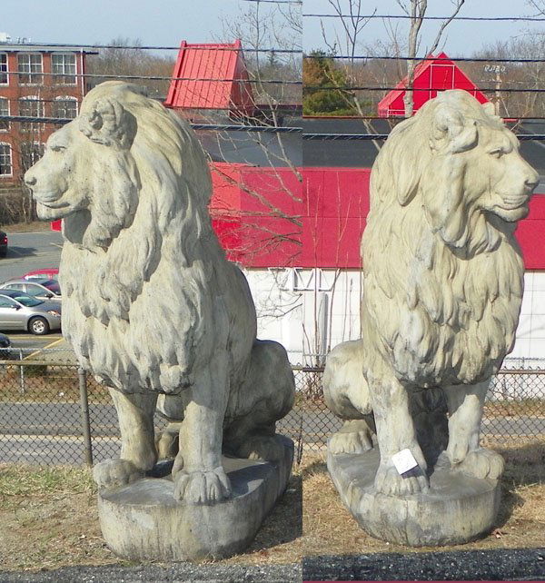 PAIR OF LIFESIZE CAST STONE SITTING LIONS 16098: Excellent for an entranceway. A pair of life-size credenza stone mirror imaged sitting lions in grey tone. (We also have a pair in white tone) Dimensions: 54"H x 19"W x 41"D Age: Contemporary Material
