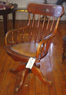 SOLID OAK OFFICE CHAIR W/SWIVEL BASE 13533X: Nice solid oak office chair with a swivel base and carved top. LOT # 13533X Dimensions: 37"H x 22"L x 18"W Age: C.Material: Oak