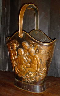 CUPID ADORNED COPPER UMBRELLA/BUCKET 13680: Nice sized copper cupid adorned umbrella stand/handled bucket. Scene shown on both sides. LOT # 13680 Dimensions: 29" H (w/ handle) 19.5" W x 9.25" D Age: C. 1900 Material: Copper