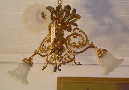 THREE ARM CHANDELIER 13483: Quaint 3 arm bronze chandelier with floral shades. LOT # 13483 Dimensions: 17"H x 26"W