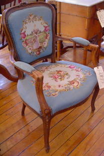 FRENCH NEEDLEPOINT ARM CHAIR LADY 12873: Elegant French needlepoint arm chair with lady back rest and floral motif seat. LOT # 12873 Dimensions: 34" H x 23" W x 19" D Age: C. 1880 Material: Wood & Needlepoint