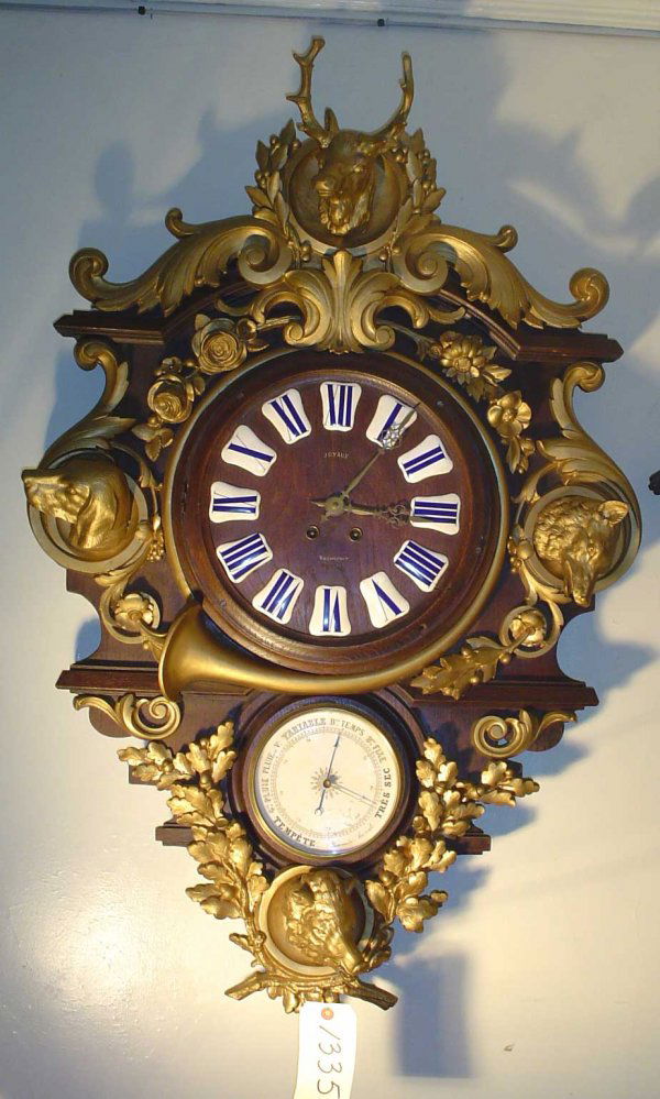 WALL CLOCK/BAROMETER Black Forest Dog, Fox ++ 13359: Superior large wood wall clock barometer with gold spelter metal mounts of dog, boar, & fox busts; leaf & berries; flowers; and French horn. Impeccably executed. Face marked Joyaux Rochefort. LOT # 13