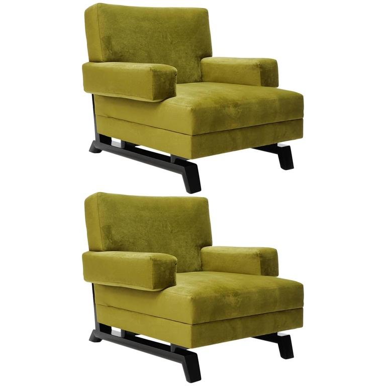 A pair of Paul Laszlo club chairs: A wonderful pair of Paul Laszlo club chairs upholstered in green velvet. Arm Height is 20".\Height: 30 in.\ Width: 32.5 in.\ Depth: 32 in.\. (Key Word Search: Edward Wormley, Dunbar, Harvey Probber, T