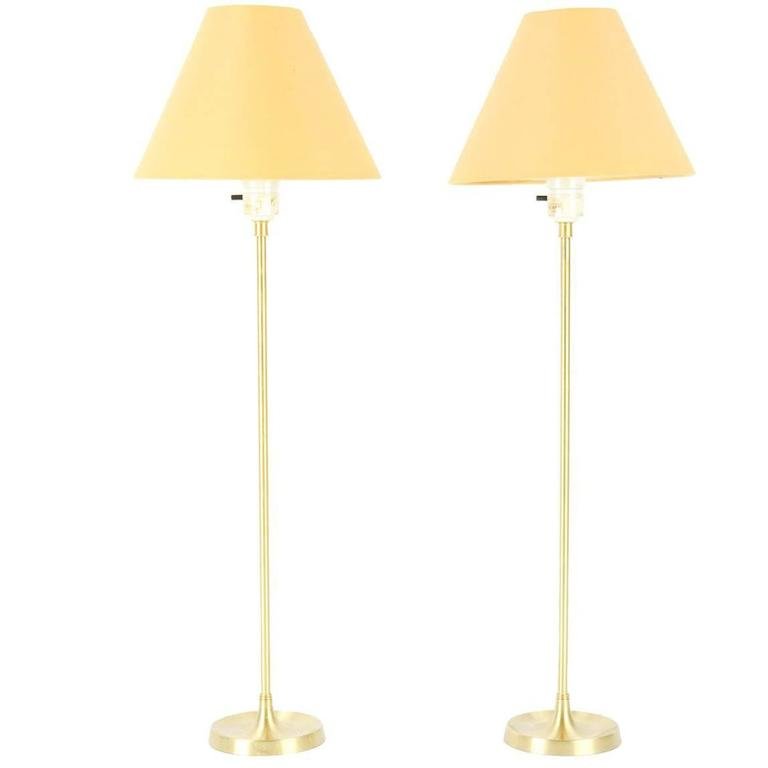 A Pair of Le Klint Model 307 Brass Table Lamps: A pair of Le Klint Model 307 brass table lamps designed by Danish designer Esben Klint. Refined, early modern design lines, circa 1948. Company label on the bottom. Sold without shades.Dimensions: 23