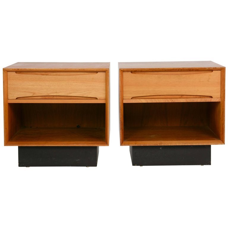 Pair of Drylund of Denmark Nightstands in Teak: A wonderful pair of Drylund nightstands from Denmark after Arne Vodder. They are free floating pieces because the backs are finished.