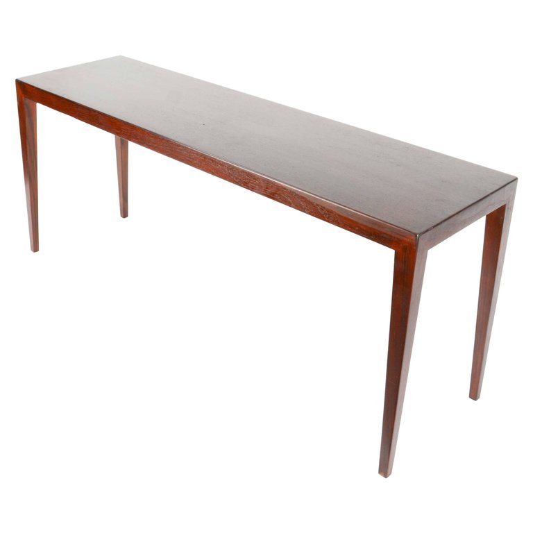 Danish Coffee Table by Severin Hansen for Haslev: An elegant coffee table by Severin Hansen Jr for Haslev Mobelfabrik. In rosewood.18 in.Hx43.25 in.Wx12.5 in.D 46 cmHx110 cmWx32 cmD