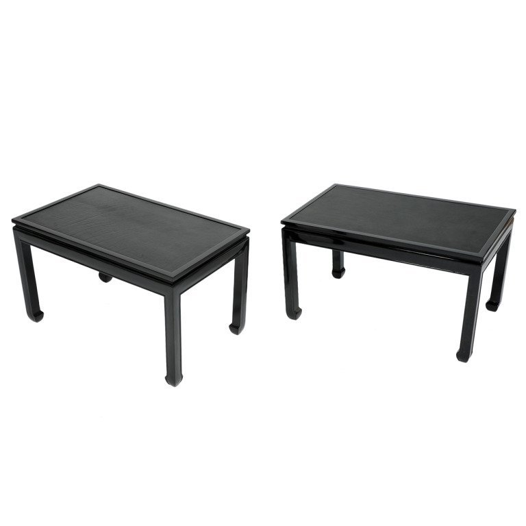 Pair of Stunning End Tables after Paul Laszlo: A stylish pair of end tables in the manner of Paul Laszlo with 'floating' leather tops. Refinished in black lacquer. Stunning, understated elegance.18 in.Hx29.75 in.Wx18 in.D