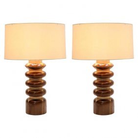 Wonderful Pair of Raymond Lowey King Lamps: A wonderful pair of Raymod Loewy King Lamps. The wood gives them wonderful accents and details that make for an amazing addition to any room. Sold with shades.28 in.H 6.5 in. Dia