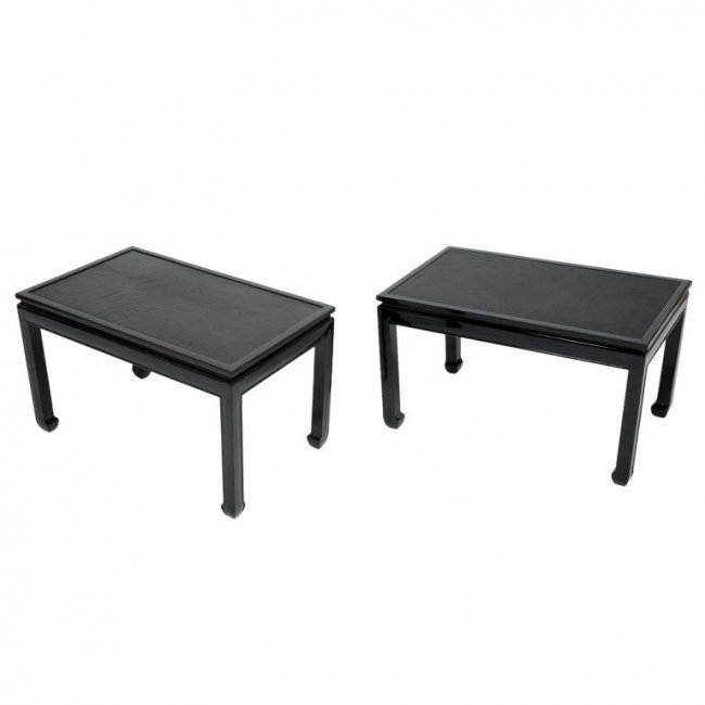 Pair of Stunning End Tables after Paul Laszlo: A stylish pair of end tables in the manner of Paul Laszlo with 'floating' leather tops. Refinished in black lacquer. Stunning, understated elegance.18 in.Hx29.75 in.Wx18 in.D